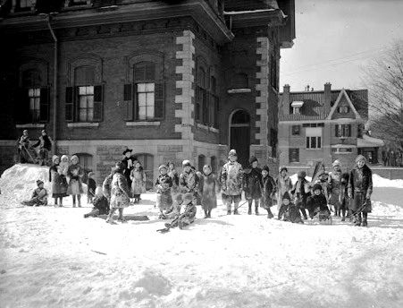 Vintage kids playing outside in snow