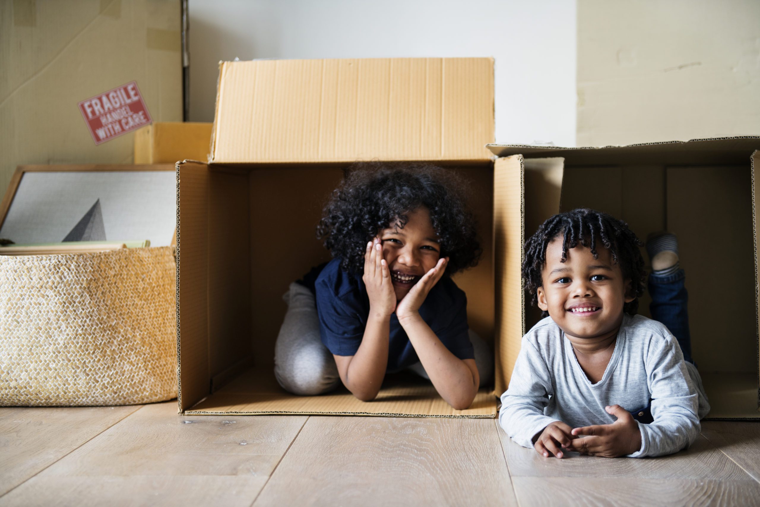 young black kids moving to new house utc